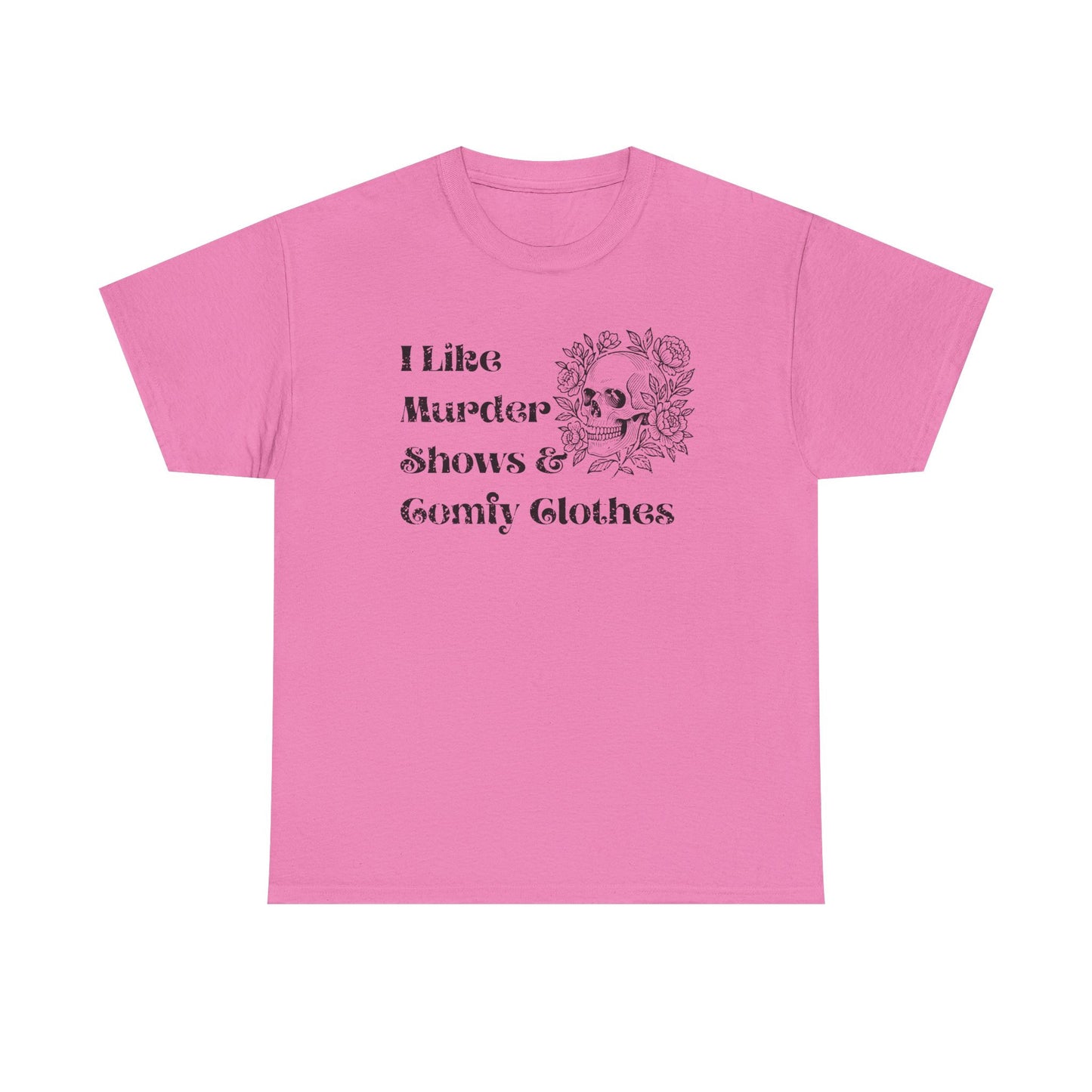 A pink short-sleeve crewneck t-shirt with a black graphic print on the front that reads 'I Like Murder Shows & Gomf Clothes' alongside a skull and roses illustration.
