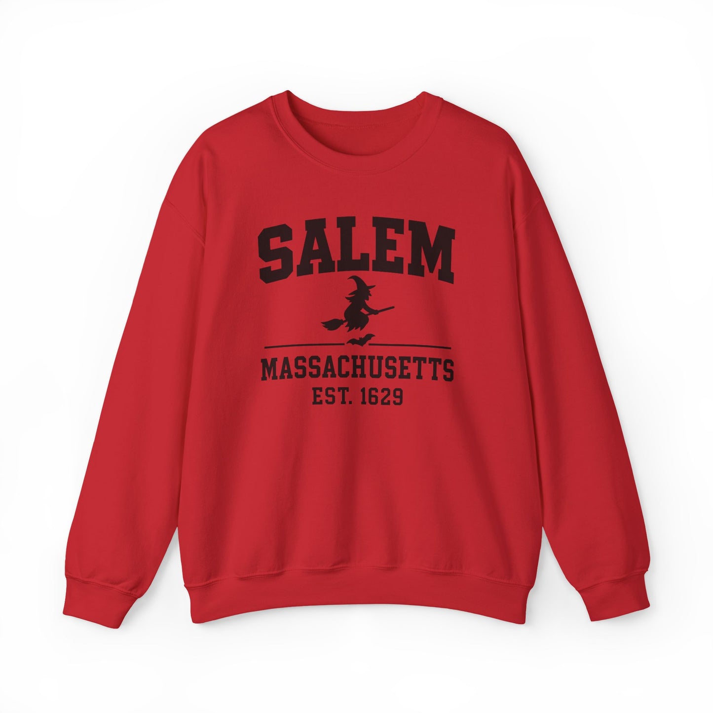 A red crewneck sweatshirt featuring a black distressed graphic print on the front that reads 'SALEM MASSASETTS EST. 1629' with a silhouette of a witch riding a broomstick.