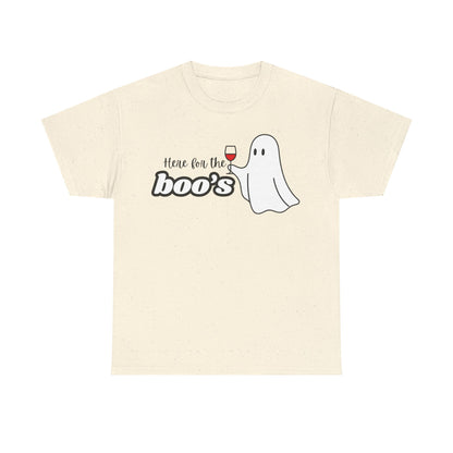 An off-white short-sleeve t-shirt with a graphic on the chest that reads 'Here for the boo's' next to a cartoon ghost holding a glass of red wine, shown against a plain white background.