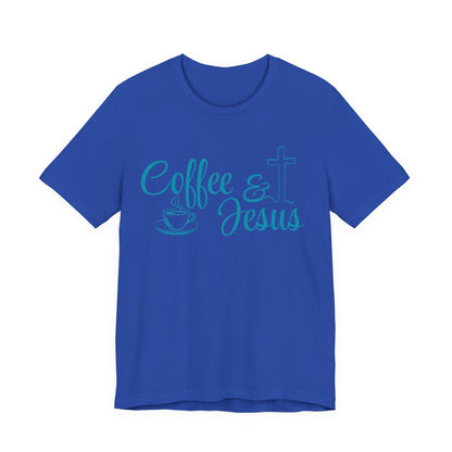 A royal blue short-sleeve crewneck t-shirt with a teal graphic on the chest reading 'Coffee & Jesus' alongside a coffee cup icon and a Christian cross.