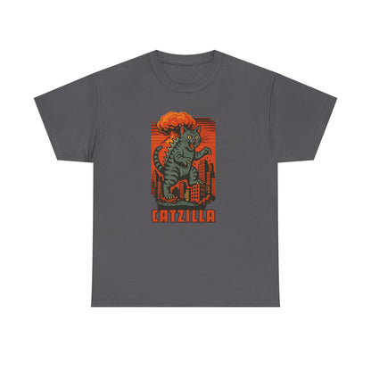 A dark gray crewneck t-shirt featuring a retro-style graphic of a green cat monster with orange hair standing in front of a red-orange striped city skyline, with the word 'CATZILLA' printed below.