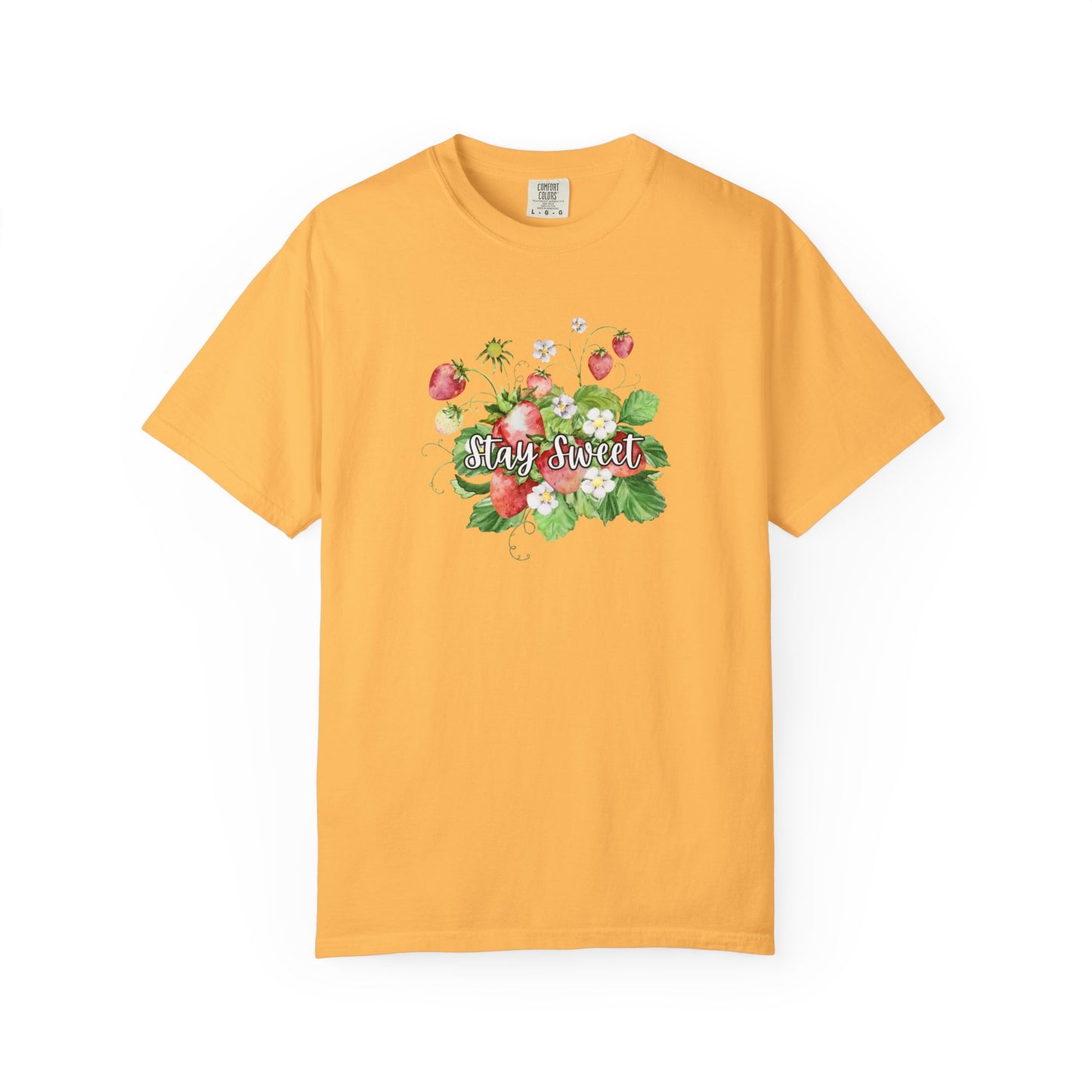 A yellow short-sleeve crewneck t-shirt featuring a colorful floral graphic on the chest with the text 'Stay Sweet' written in white cursive over pink strawberries and green leaves.