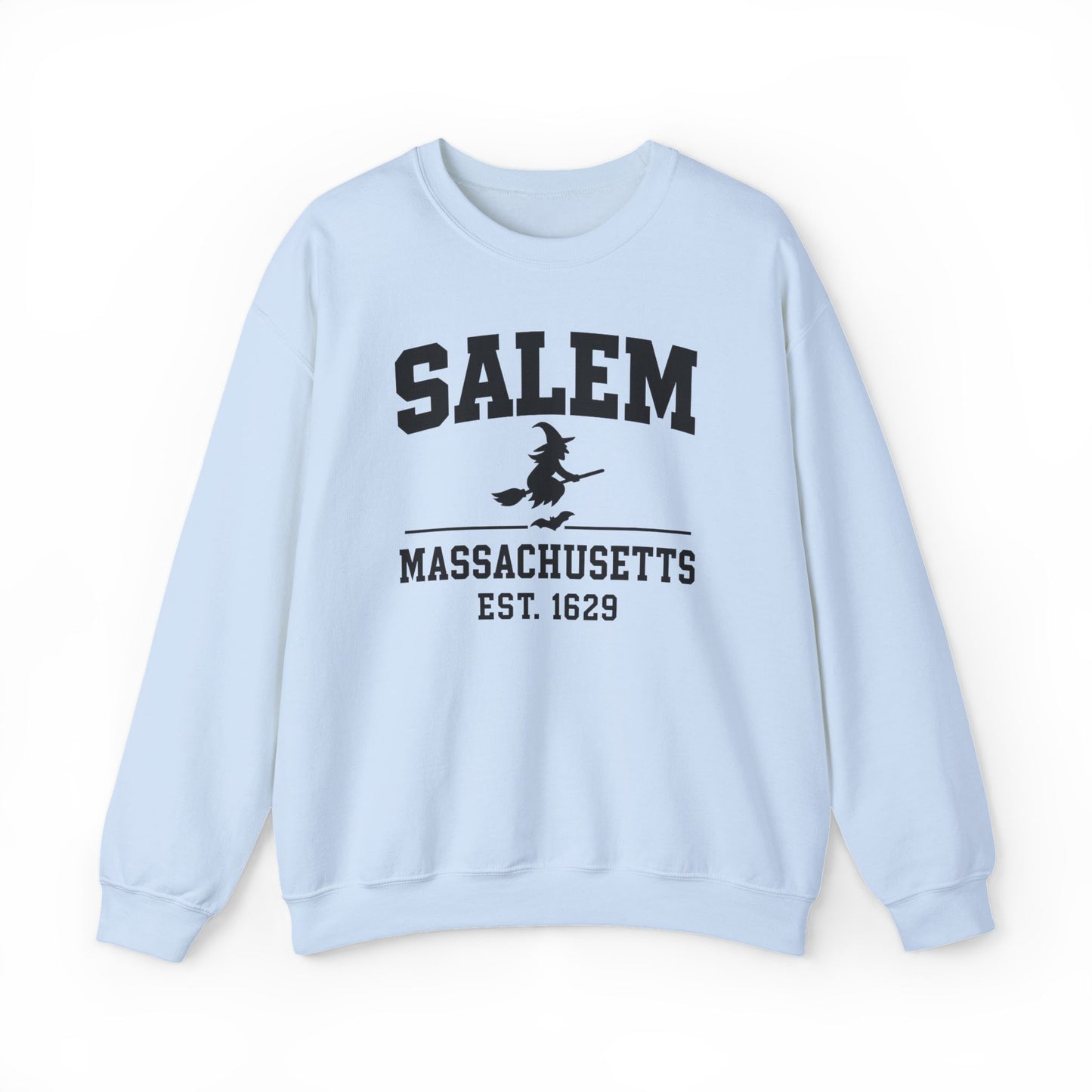 A light blue crewneck sweatshirt featuring a black graphic print on the front that reads 'SALEM MASSACHUSETTS EST. 1629' with a silhouette of a witch riding a broomstick.