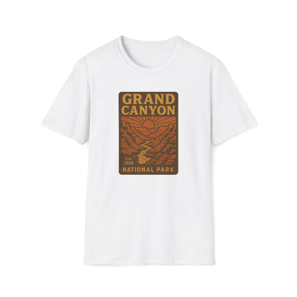 A white short-sleeve crewneck t-shirt featuring a vintage-style 'Grand Canyon National Park' graphic printed on the chest in brown and orange tones.