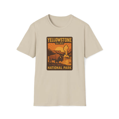 A light beige crewneck t-shirt featuring a retro-style Yellowstone National Park graphic on the chest, displayed against a solid white background.