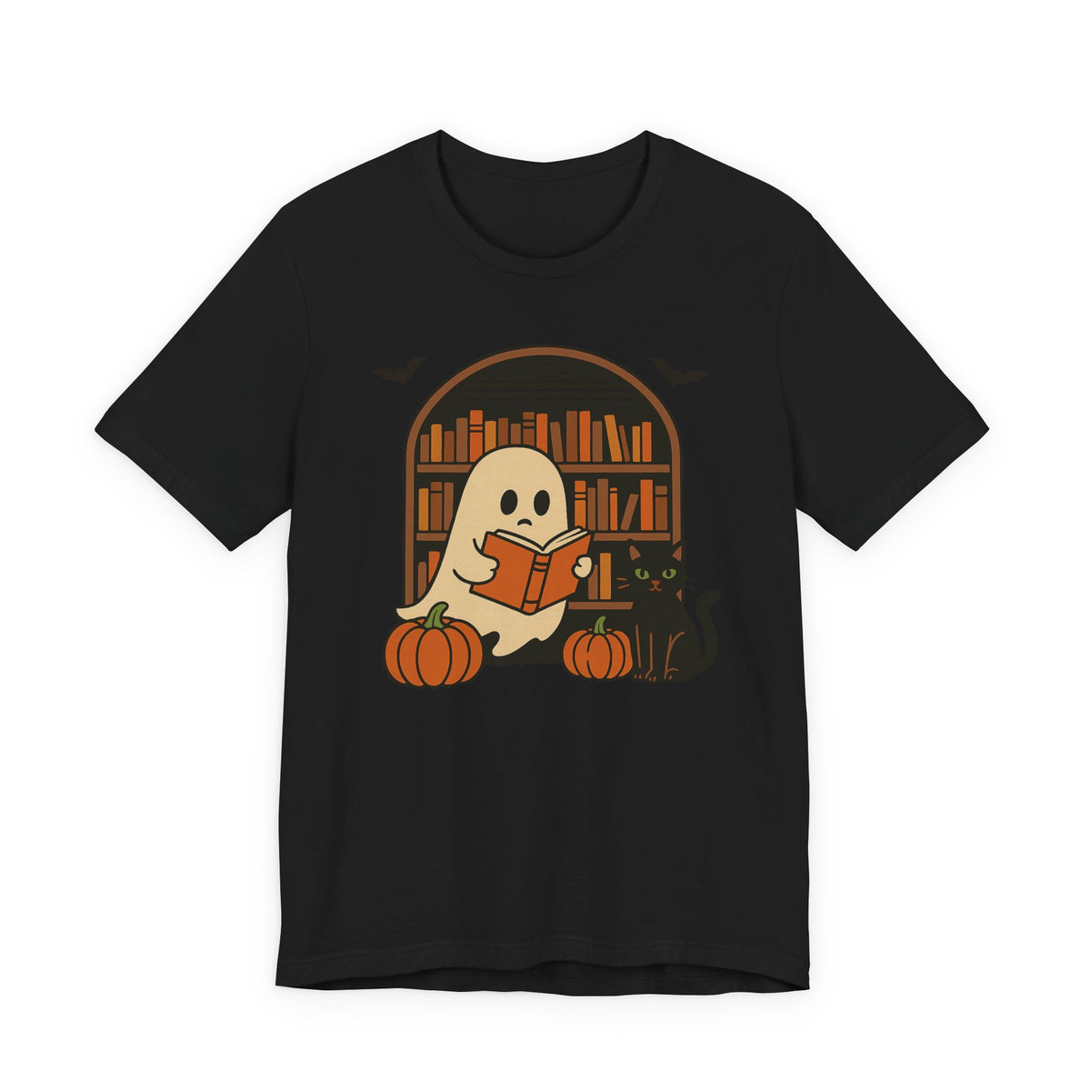 A black short-sleeve crewneck t-shirt featuring a cartoon graphic of a cute ghost reading a book in front of a bookshelf, with two pumpkins at its feet.