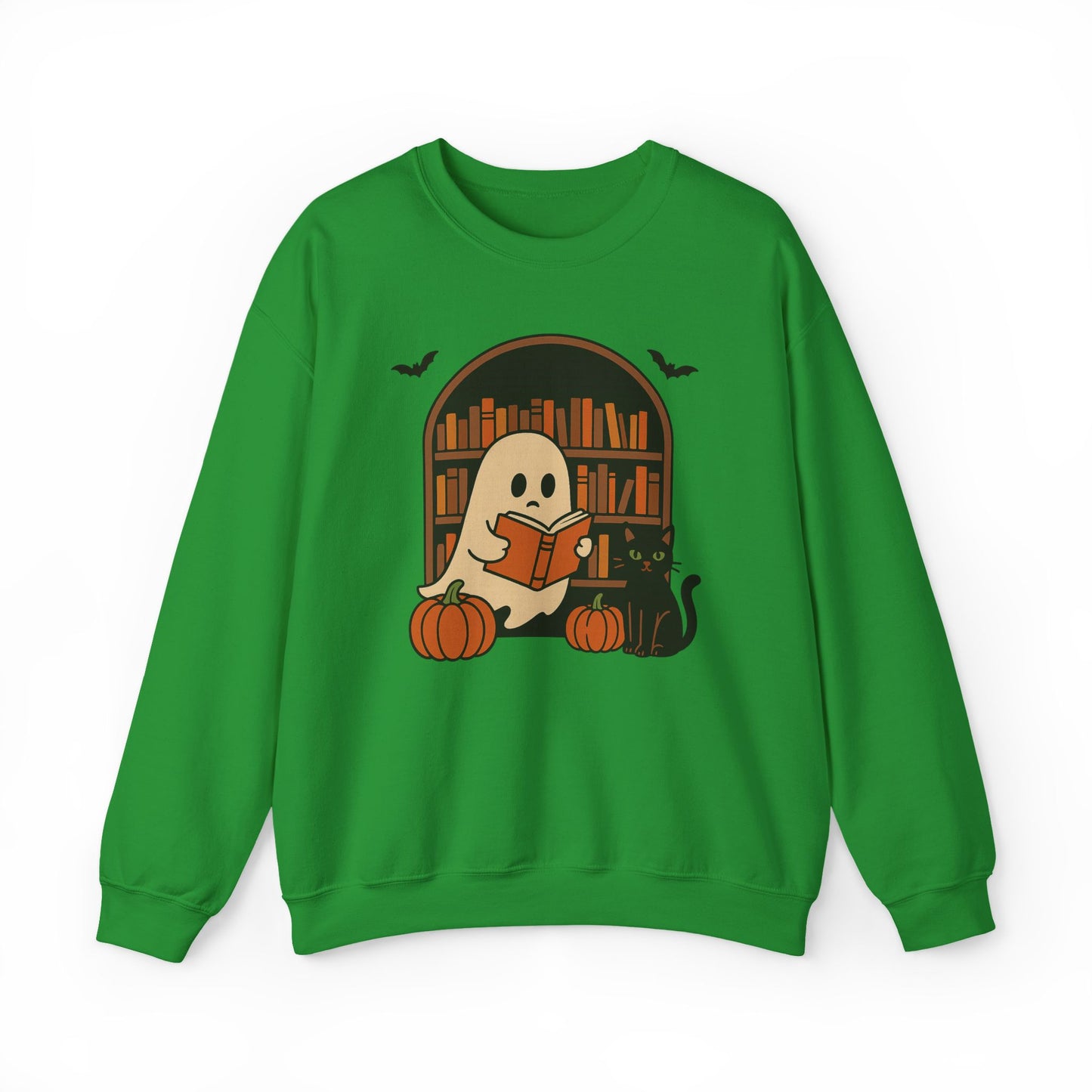 A green crewneck sweatshirt featuring a Halloween graphic of a ghost reading a book in front of a bookshelf, with pumpkins, a black cat, and bats.