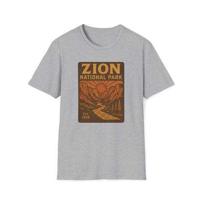 A light heather gray short-sleeve crewneck t-shirt featuring a retro-style 'Zion National Park' graphic on the chest in brown and orange tones.