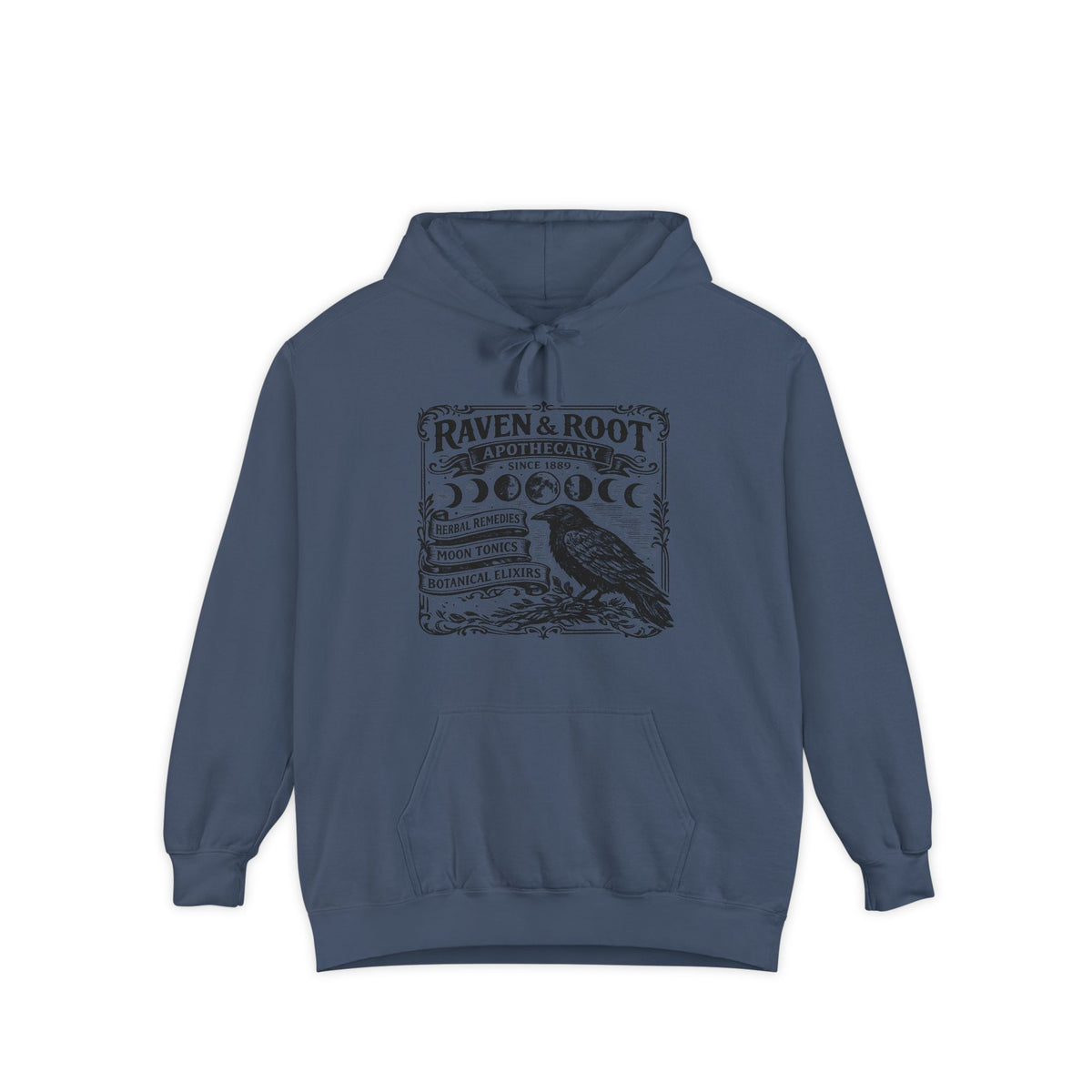 A slate blue pullover hoodie with a dark graphic print on the front featuring a raven and the text 'RAVEN & ROOT'.