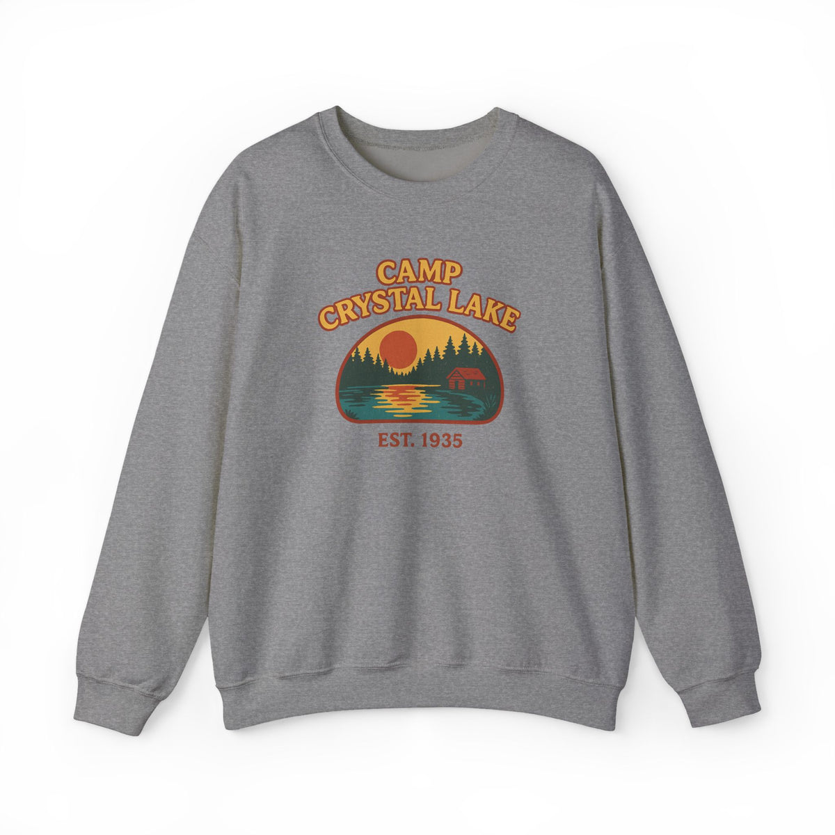 A heather gray crewneck sweatshirt featuring a retro-style 'Camp Crystal Lake' graphic on the chest with a sunset, trees, and a deer silhouette.