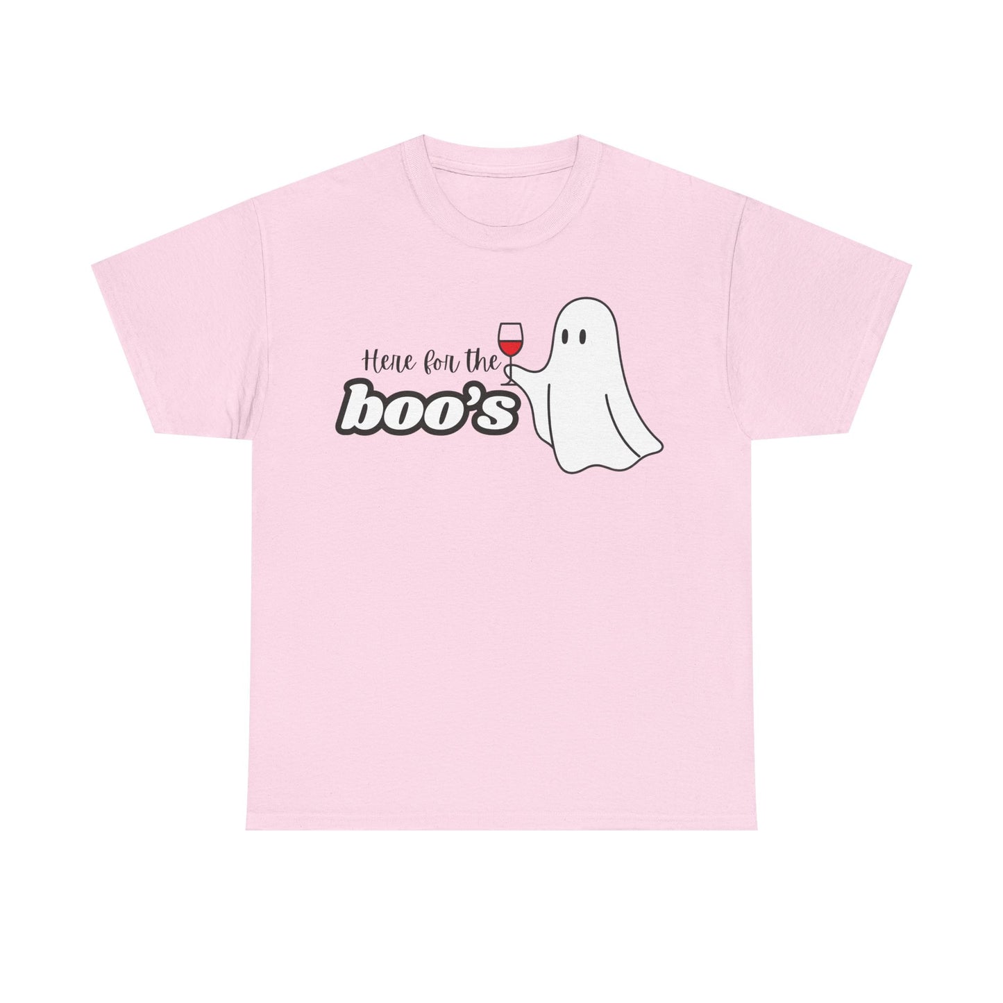 A light pink short-sleeve crewneck t-shirt featuring a graphic on the chest with the text 'Here for the boo's' in black and white bubble letters, next to a cute white cartoon ghost holding a glass of red wine.