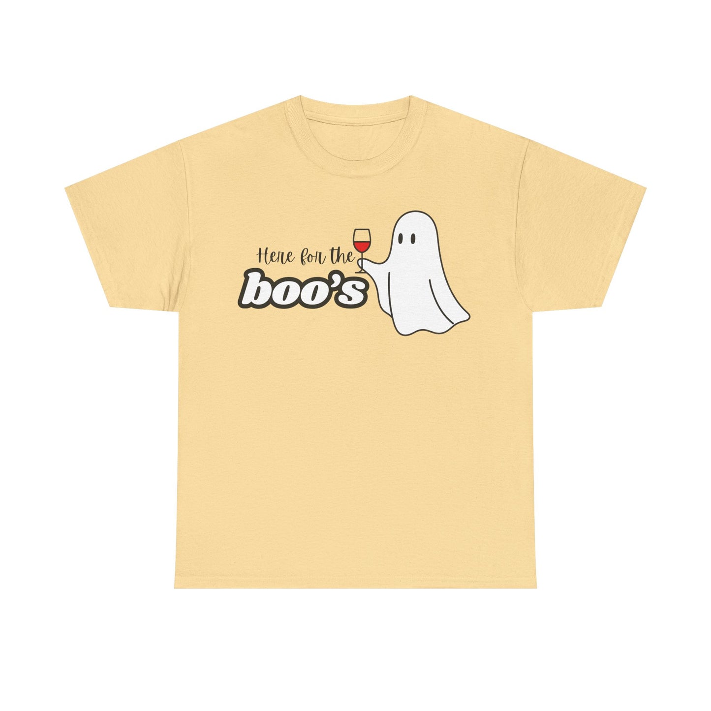 A pale yellow short-sleeve t-shirt with a graphic on the chest that reads 'Here for the boo's' next to a cartoon ghost holding a glass of red wine, shown on a plain white background.