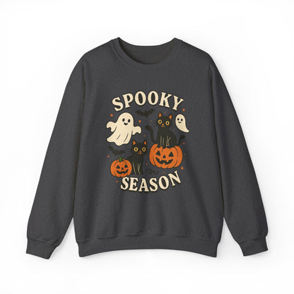 A dark gray crewneck sweatshirt featuring a 'Spooky Season' graphic with cartoon ghosts, black cats, and jack-o'-lantern pumpkins on a white background.