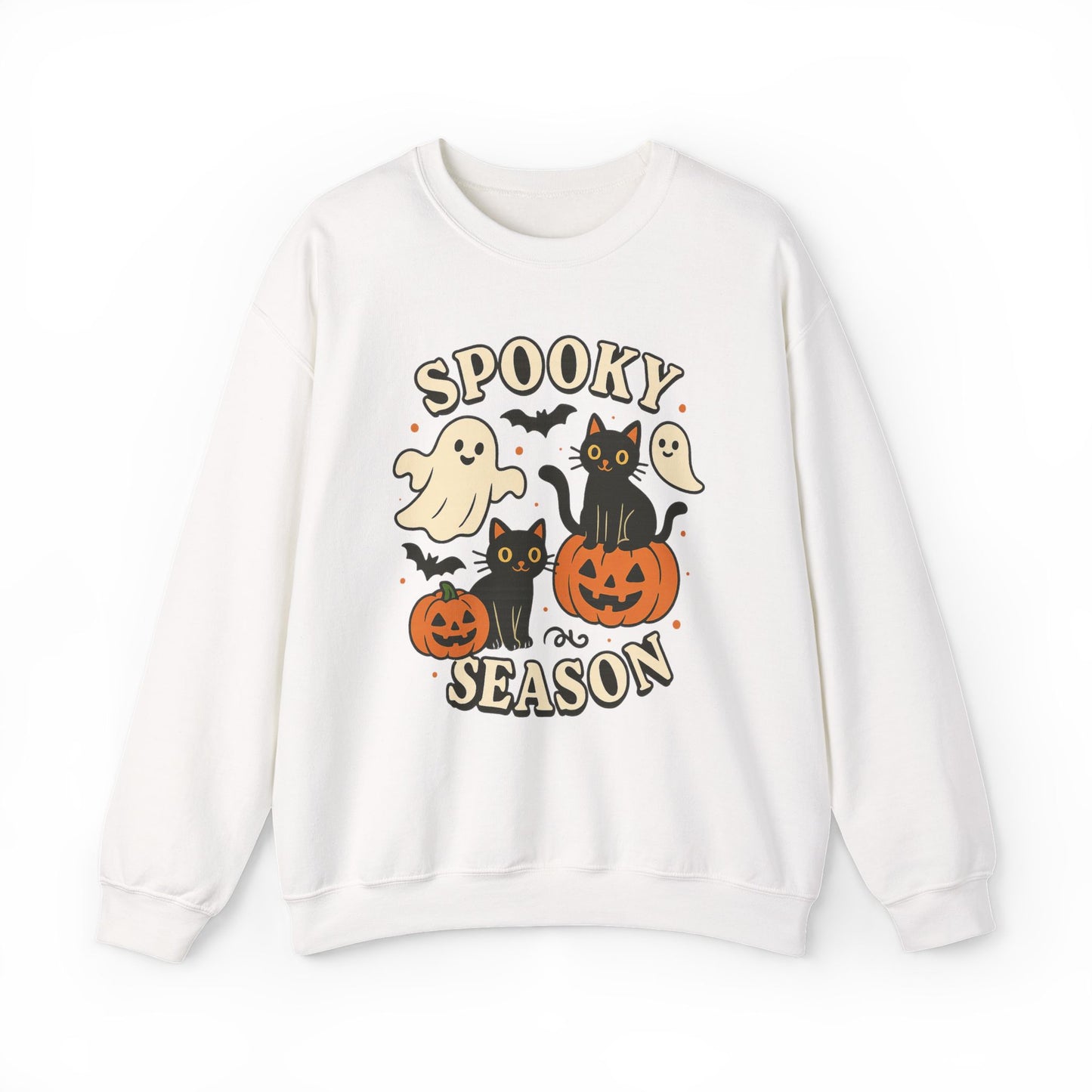 A white crewneck sweatshirt featuring a colorful Halloween graphic with the text 'SPOOKY SEASON' and illustrations of ghosts, black cats, pumpkins, and bats.