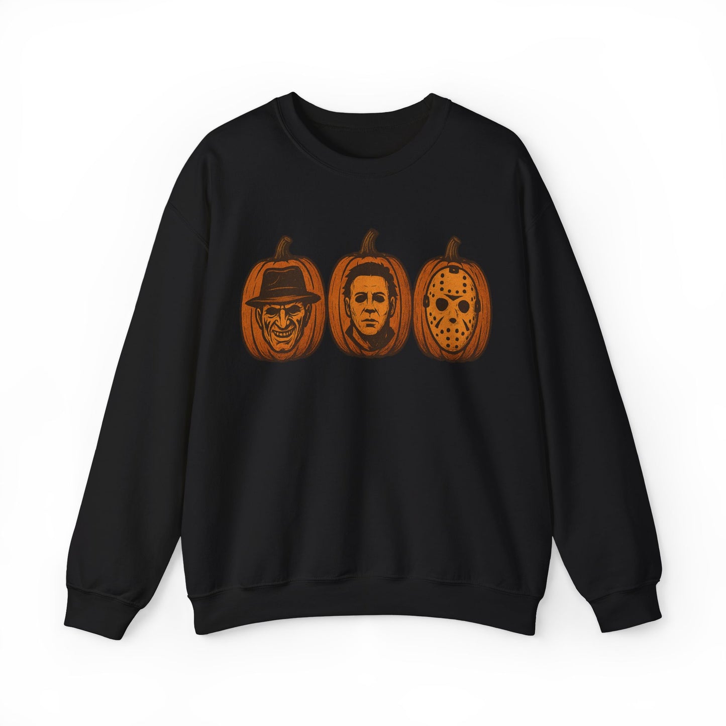 A black crewneck sweatshirt featuring a graphic print of three horror movie pumpkin masks (Michael Myers, Jason Voorhees, and Freddy Krueger) in orange-brown tones, displayed against a plain white background.