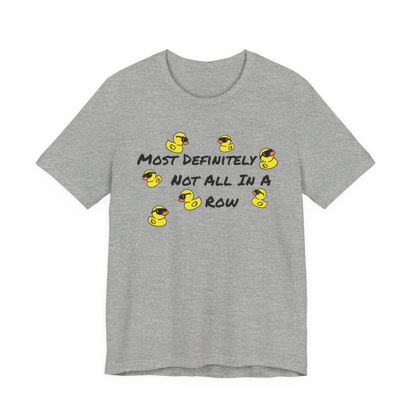 A heather gray short-sleeve t-shirt with a graphic print featuring yellow rubber ducks and the text 'MOST DEFINITELY NOT ALL IN A ROW' in black.