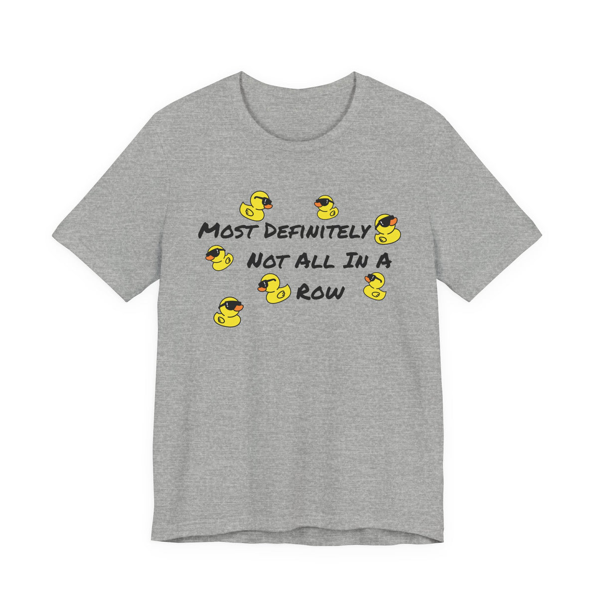 A heather gray short-sleeve t-shirt with a graphic print featuring yellow rubber ducks and the text 'MOST DEFINITELY NOT ALL IN A ROW' in black.