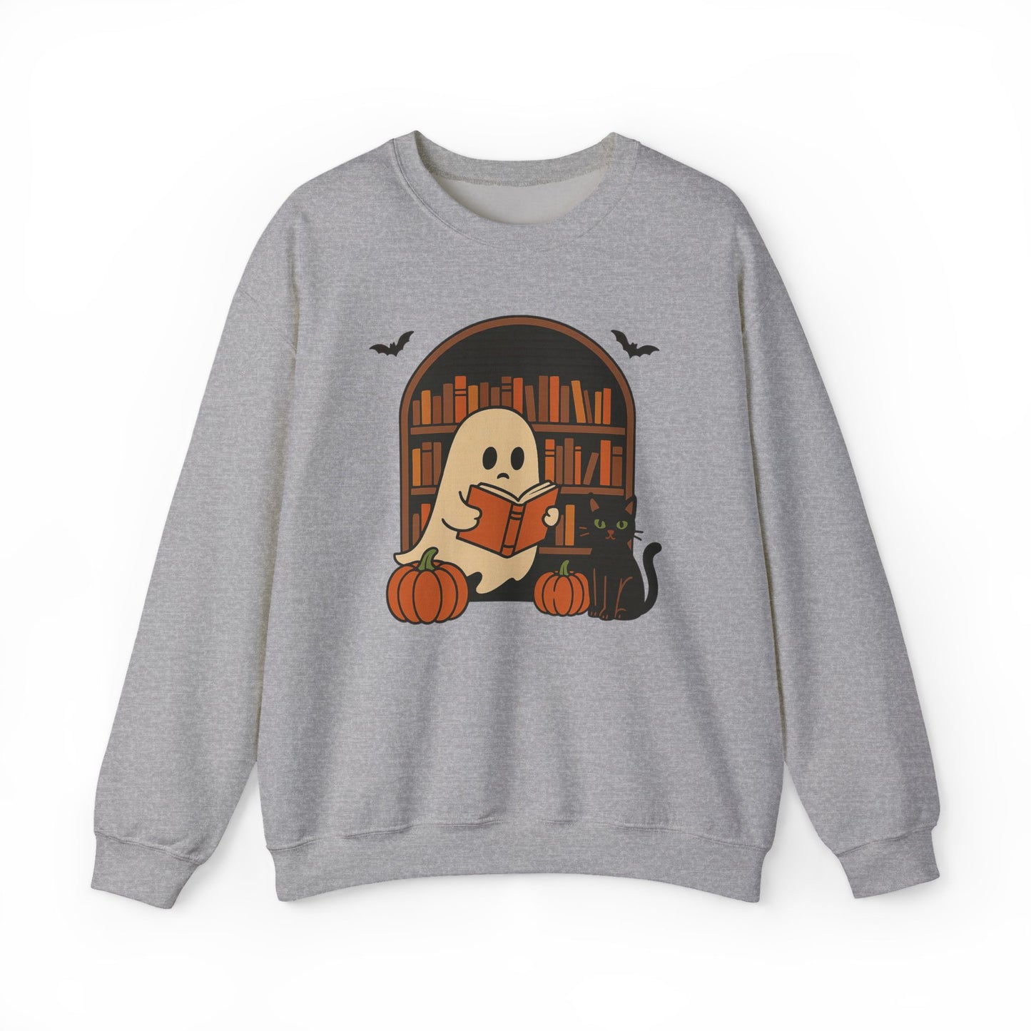 A heather gray crewneck sweatshirt featuring a Halloween graphic of a ghost reading a book in front of a bookshelf, with pumpkins, a black cat, and bats.