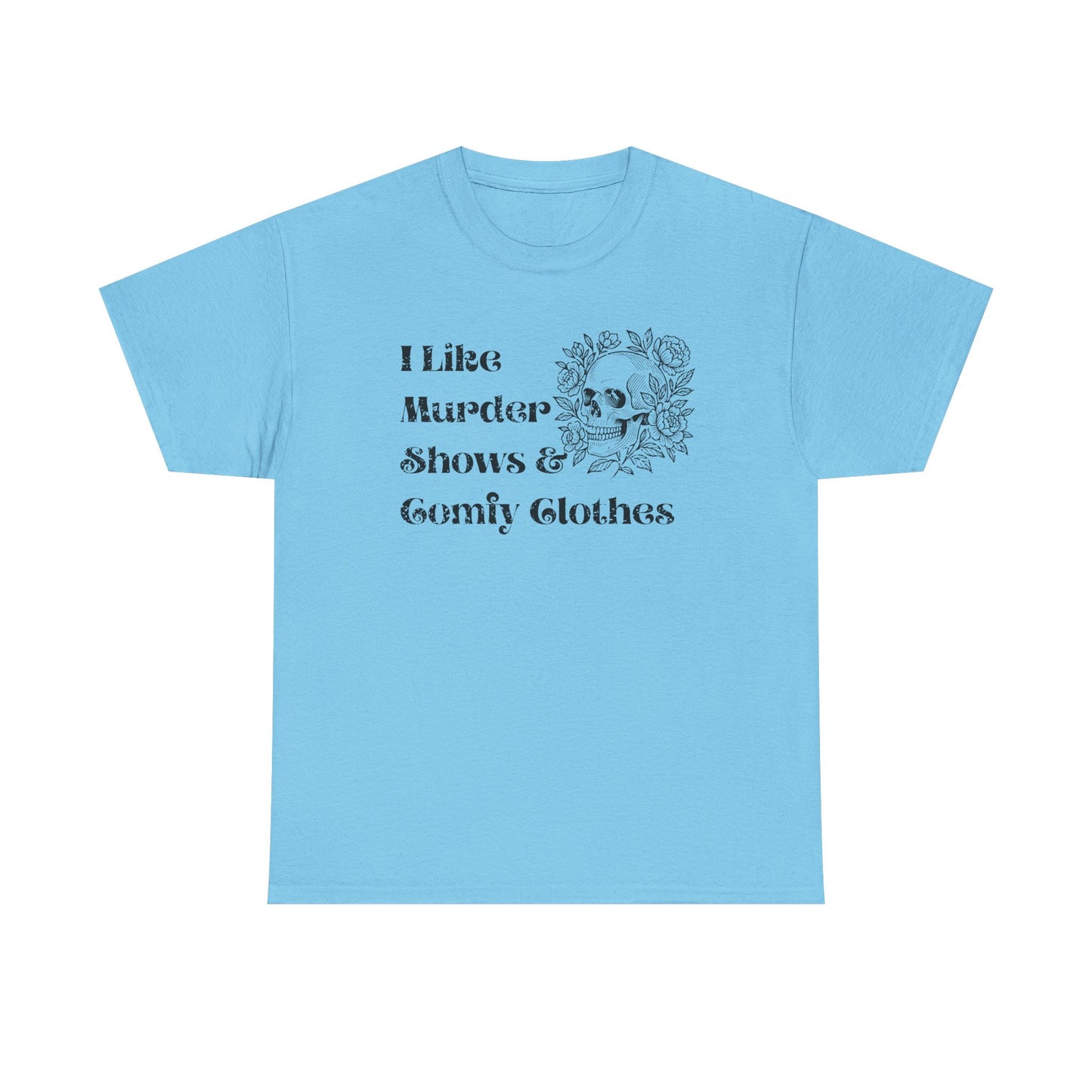 A light blue short-sleeve t-shirt with a black graphic print on the front that reads 'I Like Murder Shows & Gomf Clothes' alongside a skull and roses illustration, displayed on a solid white background.