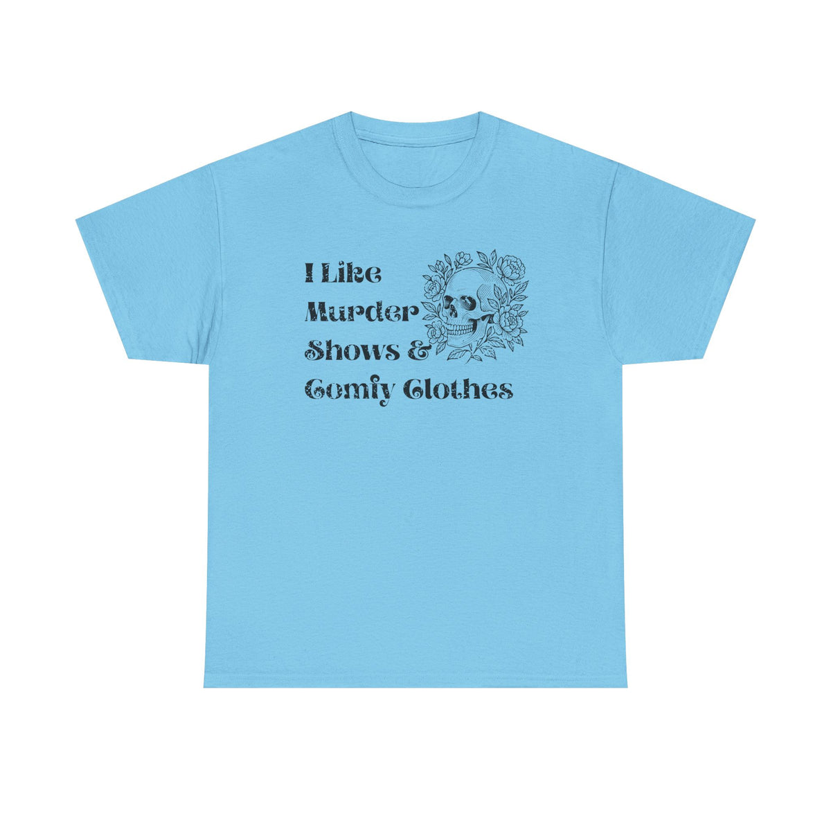 A light blue short-sleeve t-shirt with a black graphic print on the front that reads 'I Like Murder Shows & Gomf Clothes' alongside a skull and roses illustration, displayed on a solid white background.