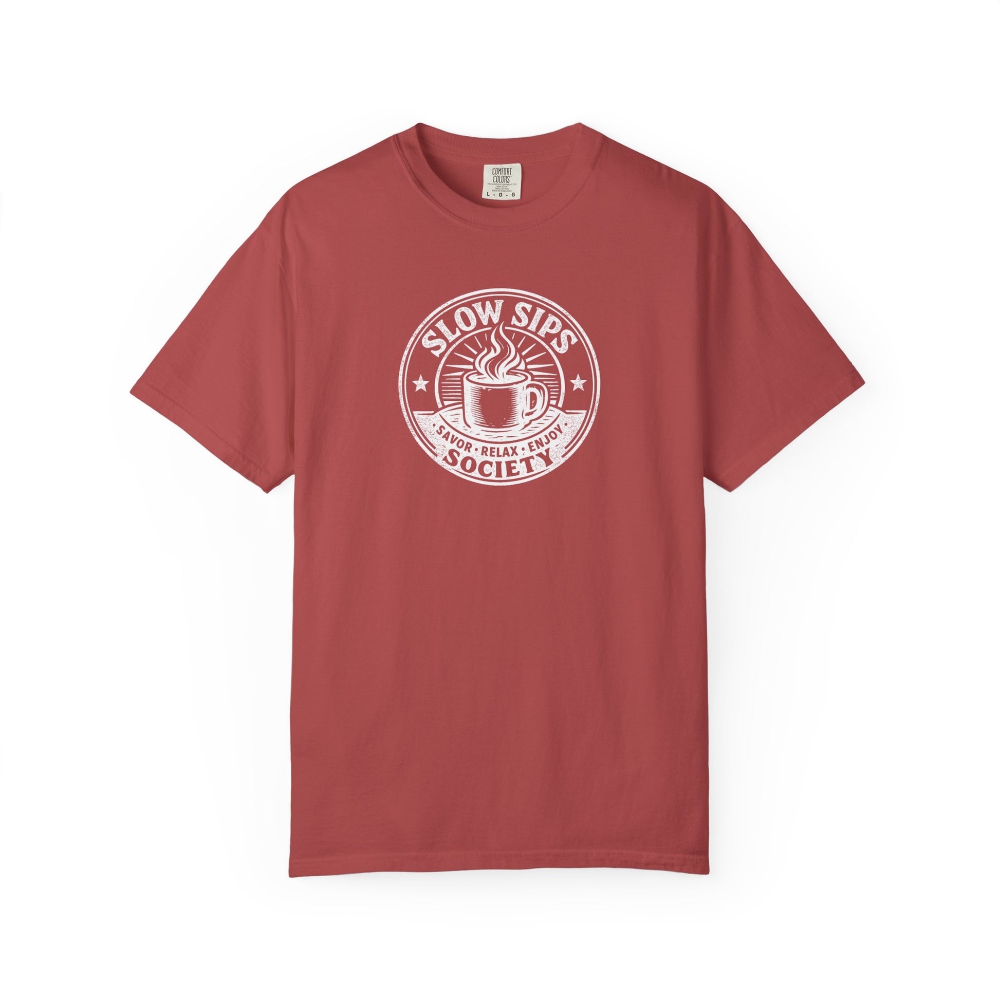 A dusty red short-sleeve crewneck t-shirt with a white circular graphic on the chest that reads 'SLOW SIPS SOCIETY' around an illustration of a coffee cup.