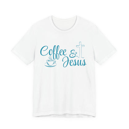 A white short-sleeve crewneck t-shirt with a light blue graphic on the chest reading 'Coffee & Jesus' alongside a coffee cup and a cross.