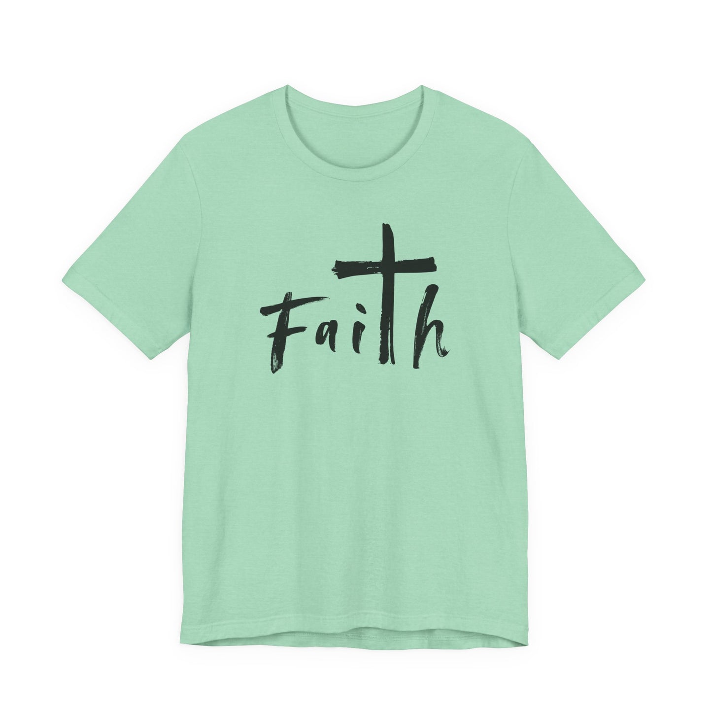 A mint green short-sleeve t-shirt with a black graphic on the chest featuring a cross and the word 'Faith' in a handwritten font, displayed on a solid white background.