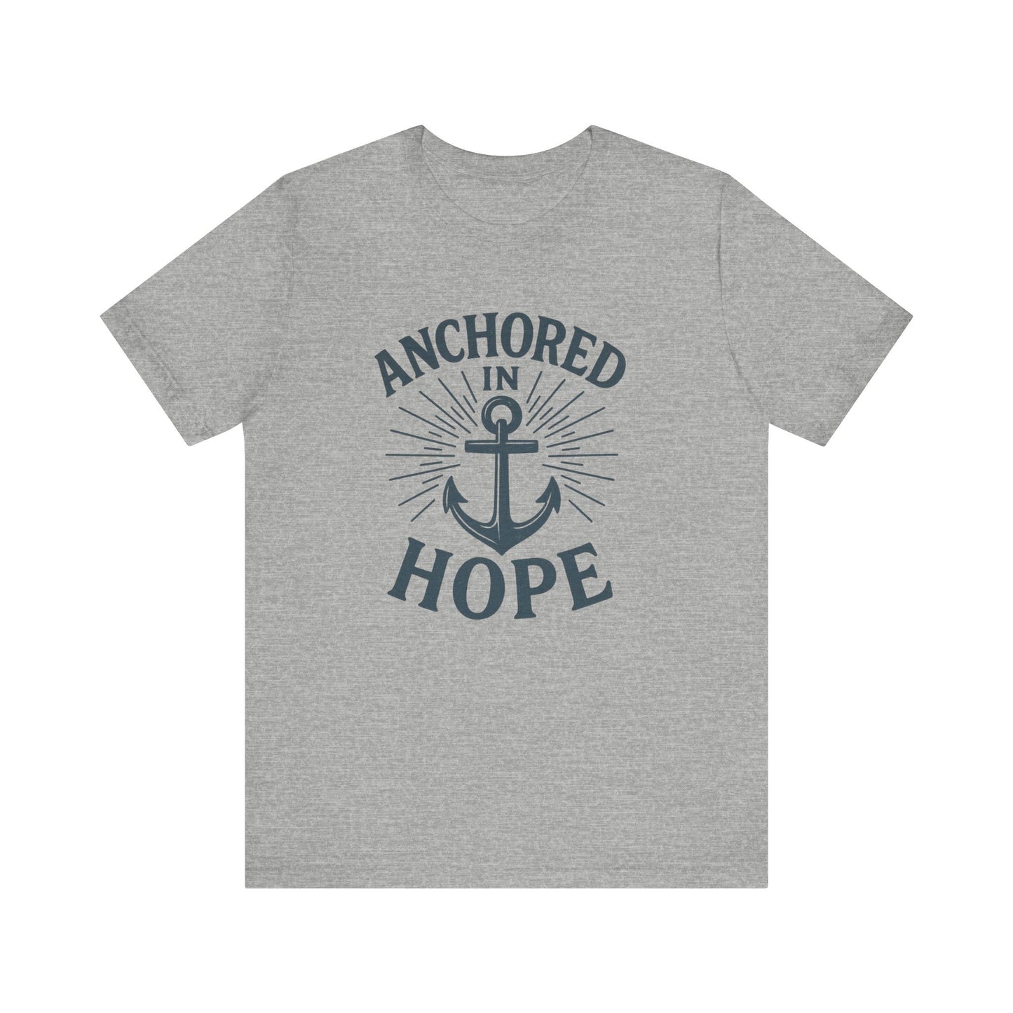A heather gray short-sleeve crewneck t-shirt featuring a navy blue graphic on the front with the words 'ANCHORED IN HOPE' surrounding an anchor and sunburst design.