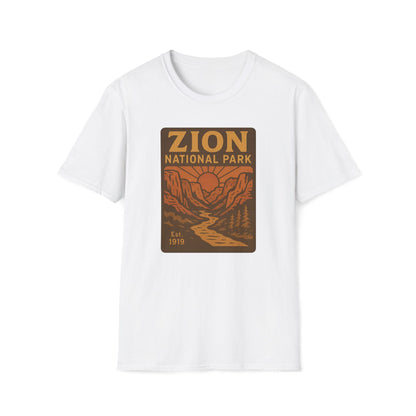 A white short-sleeve crewneck t-shirt featuring a retro-style graphic print of Zion National Park on the chest, displayed against a solid white background.